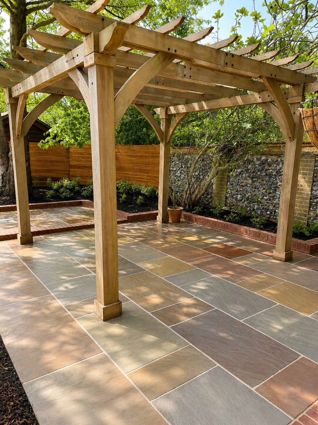 Garden structure with surrounding paving and planting