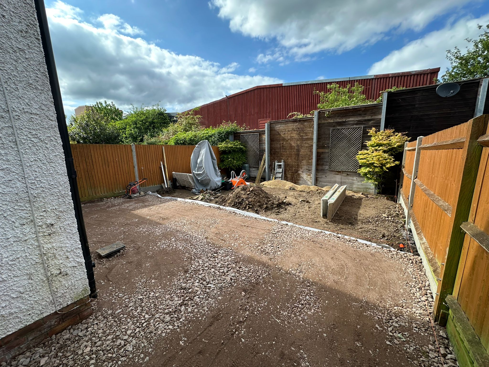Garden before the From Deck to Structured Garden landscaping project in Letchworth Garden City.