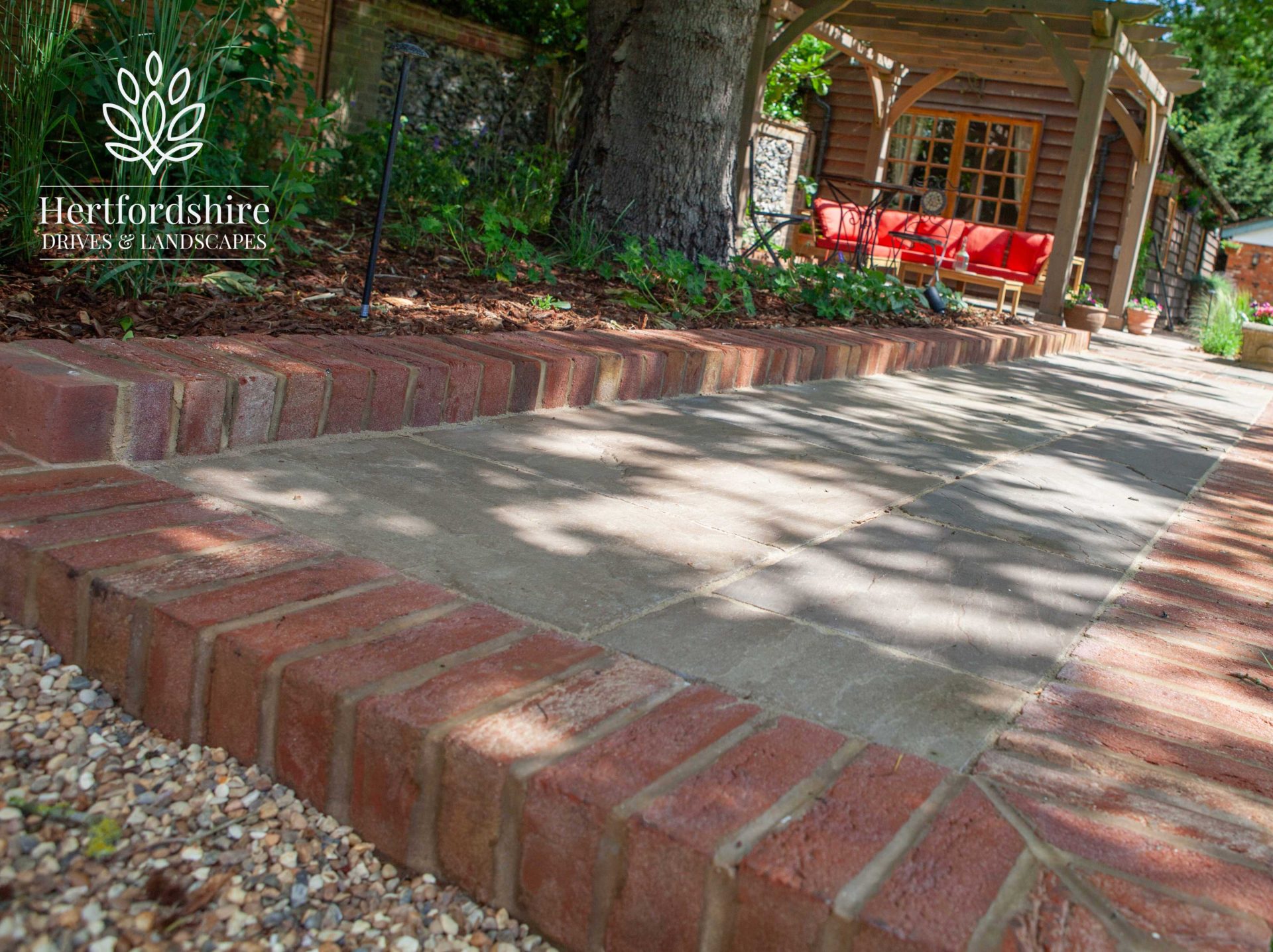 Path Goals in the finished Stone Terrace & Brick Detail garden in Ardley.