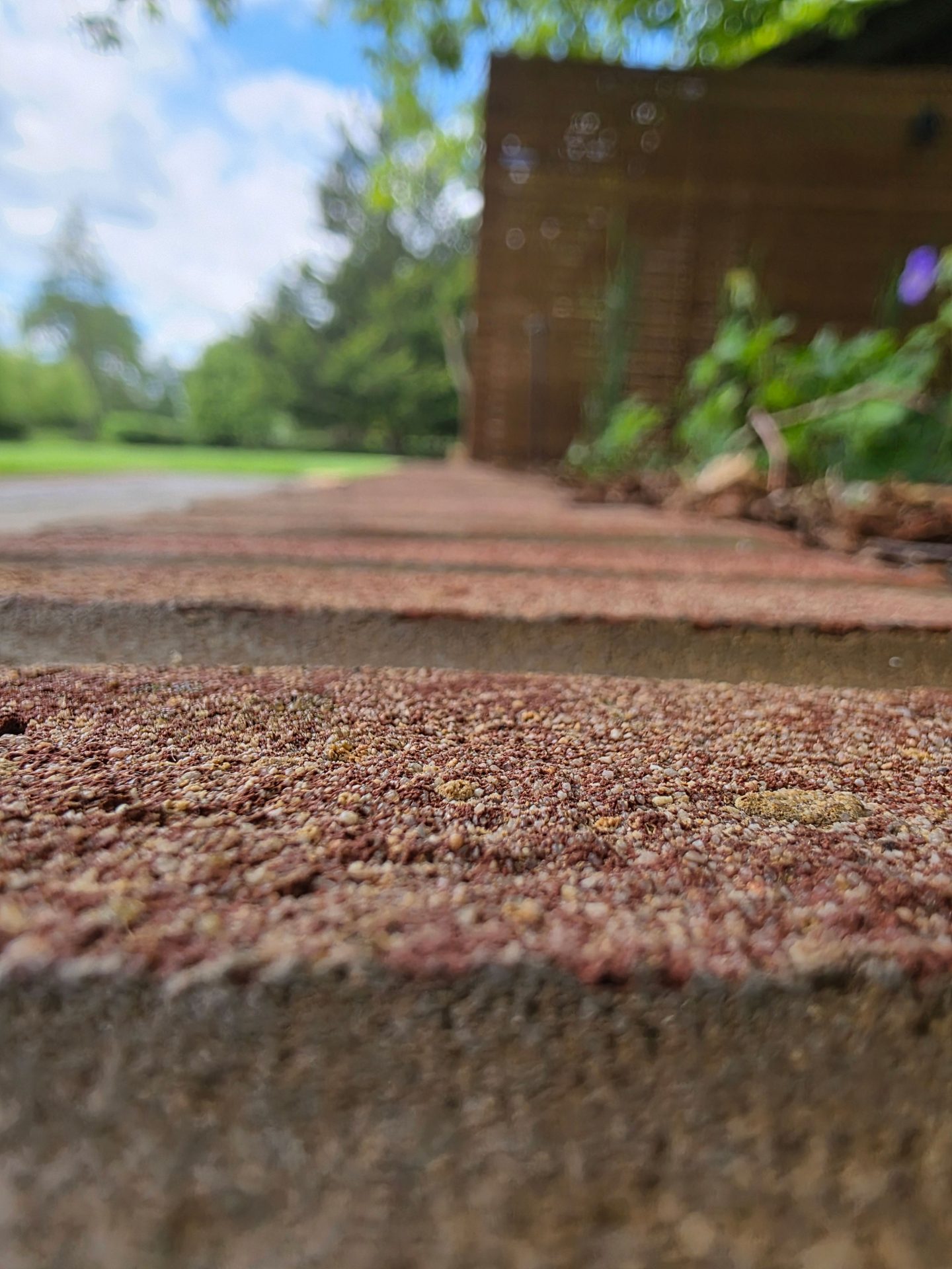 Wide view of the finished Ardley garden for the Stone Terrace & Brick Detail project.