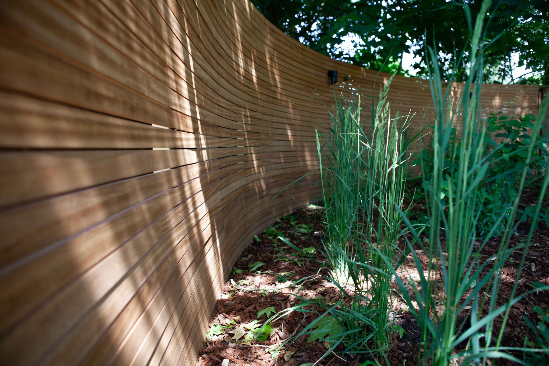 Wide view of the finished Ardley garden for the Stone Terrace & Brick Detail project.