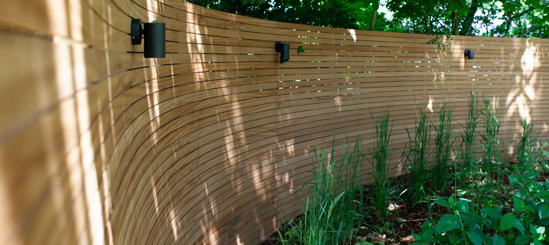 Wide view of the finished Ardley garden for the Stone Terrace & Brick Detail project.