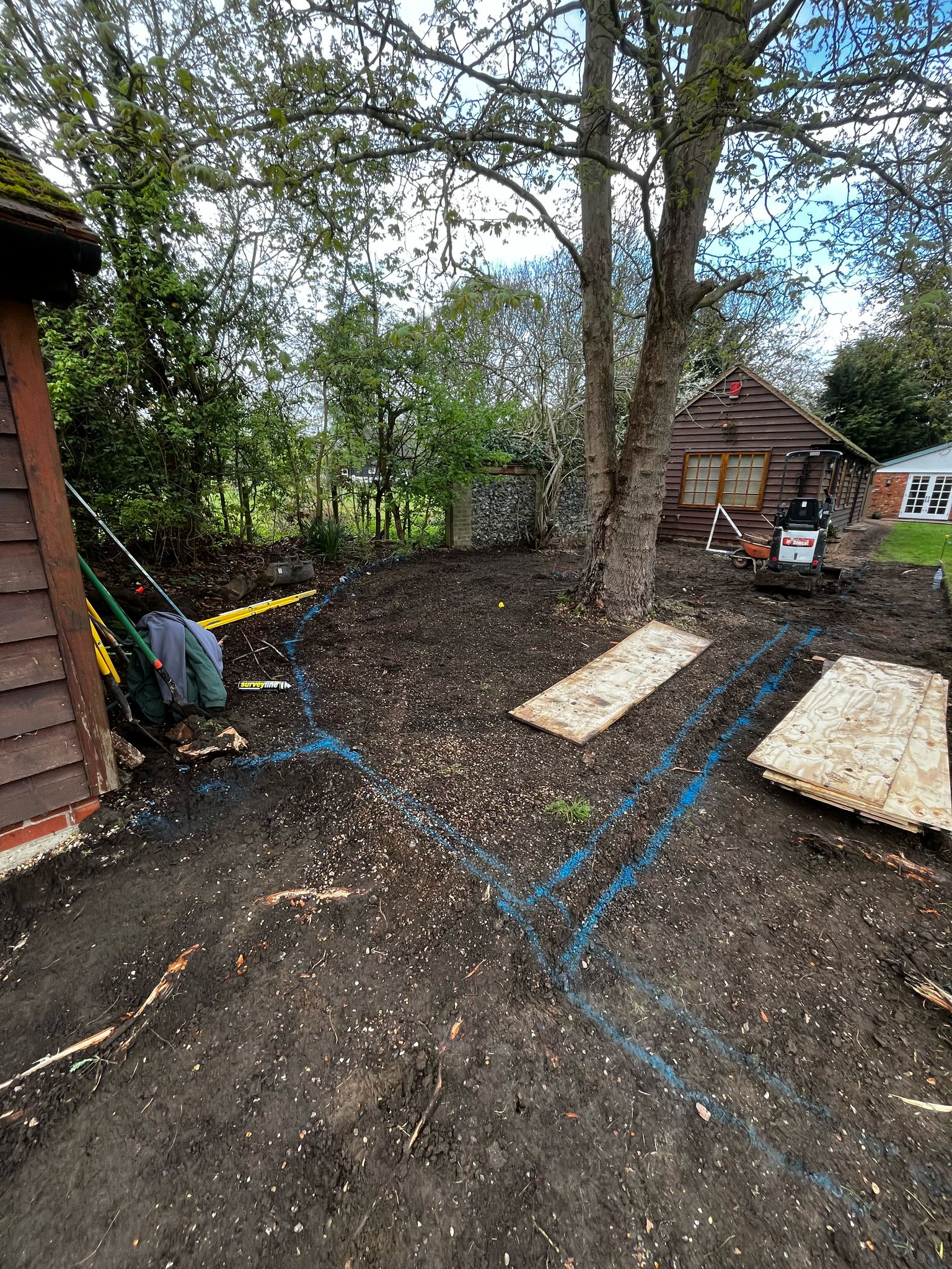 Garden before the Stone Terrace & Brick Detail landscaping project in Ardley.