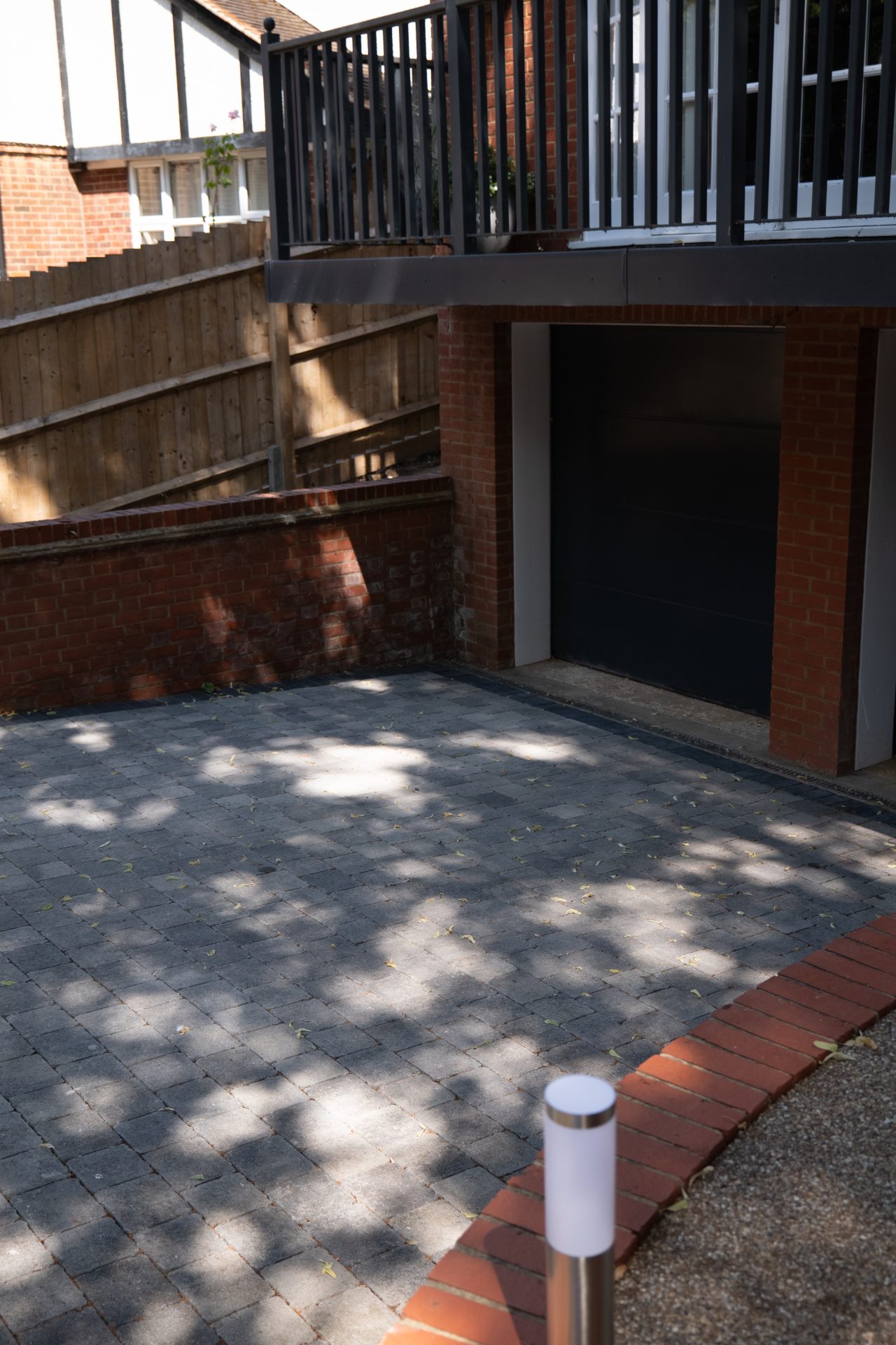 Wide view of the finished Hitchin garden for the Permeable Driveway with Room to Turn project.