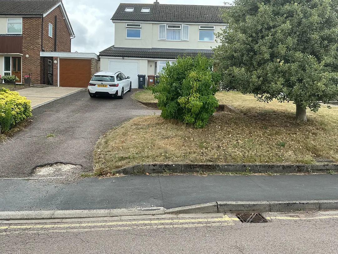 Garden before the From Slope to Surface landscaping project in Ware.