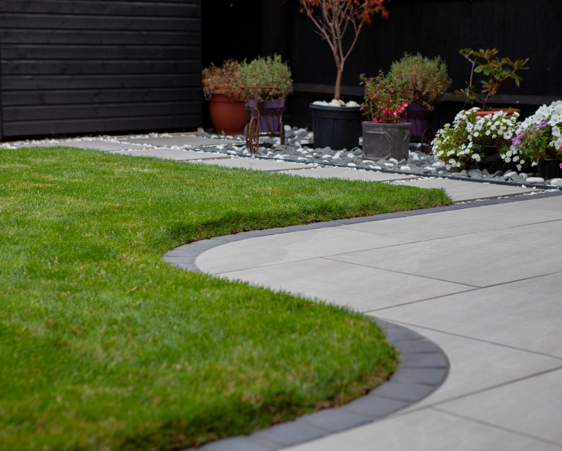 Hertfordshiredrivesandlandscapes Luton Nj in the finished Three Patios & Central Lawn garden in Luton.