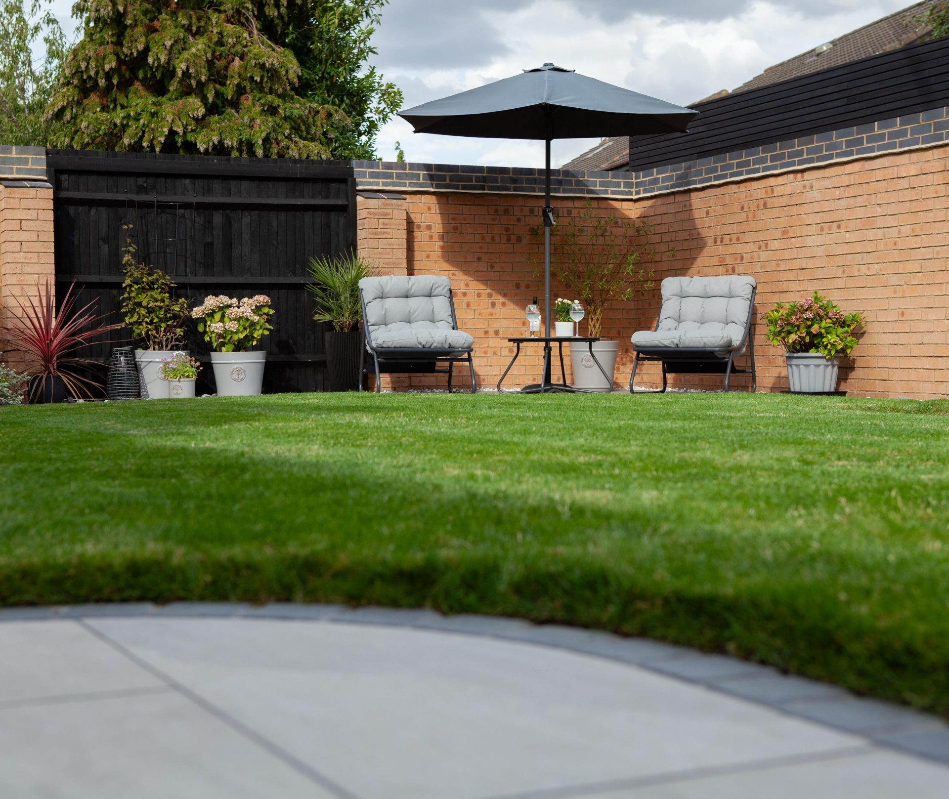 Hertfordshiredrivesandlandscapes Luton Nj in the finished Three Patios & Central Lawn garden in Luton.
