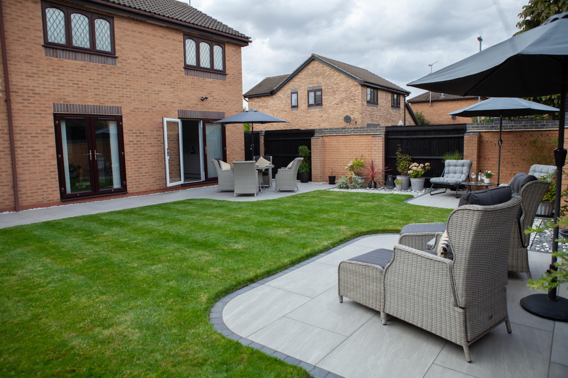 Hertfordshiredrivesandlandscapes Luton Nj in the finished Three Patios & Central Lawn garden in Luton.