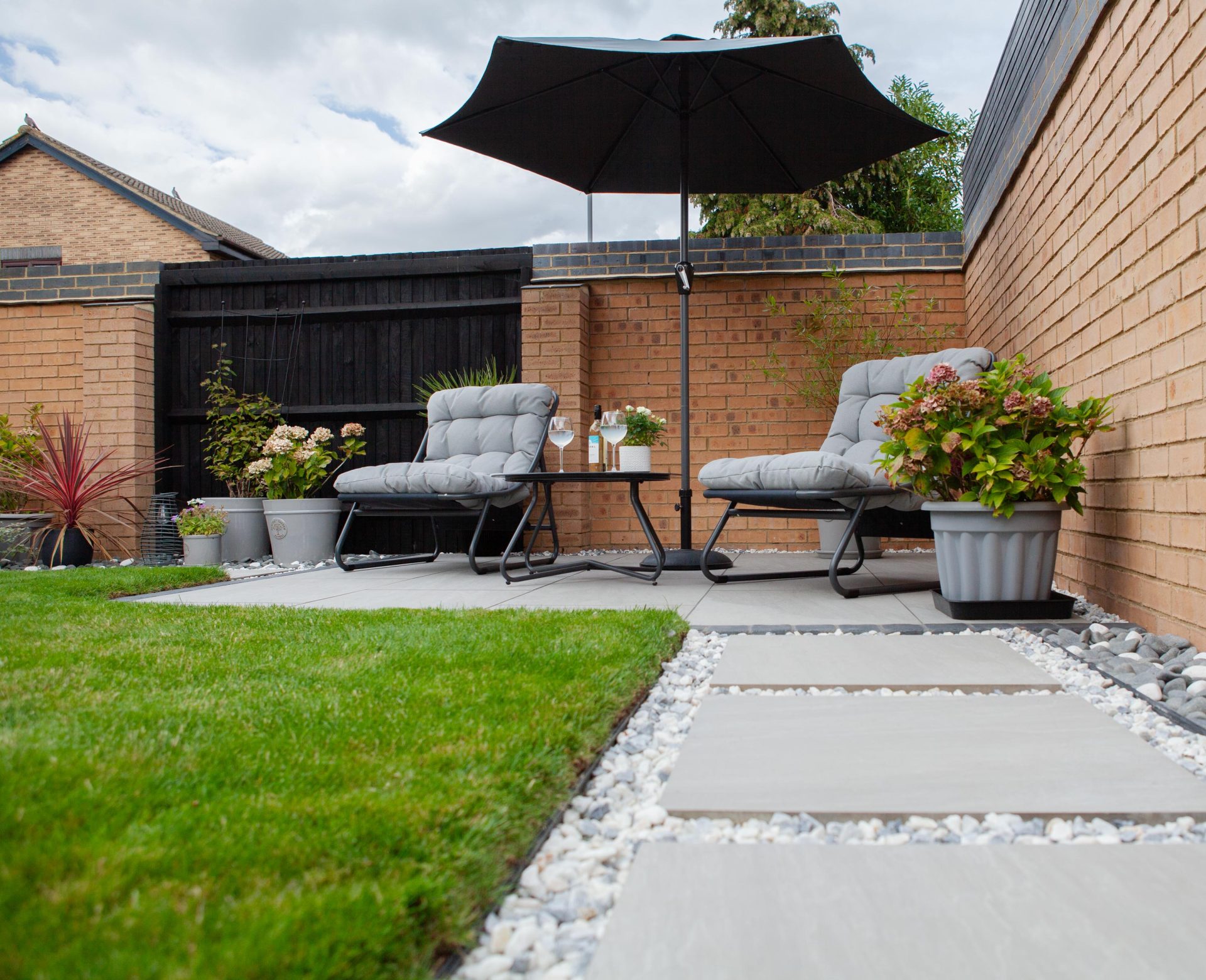 Hertfordshiredrivesandlandscapes Luton Nj in the finished Three Patios & Central Lawn garden in Luton.