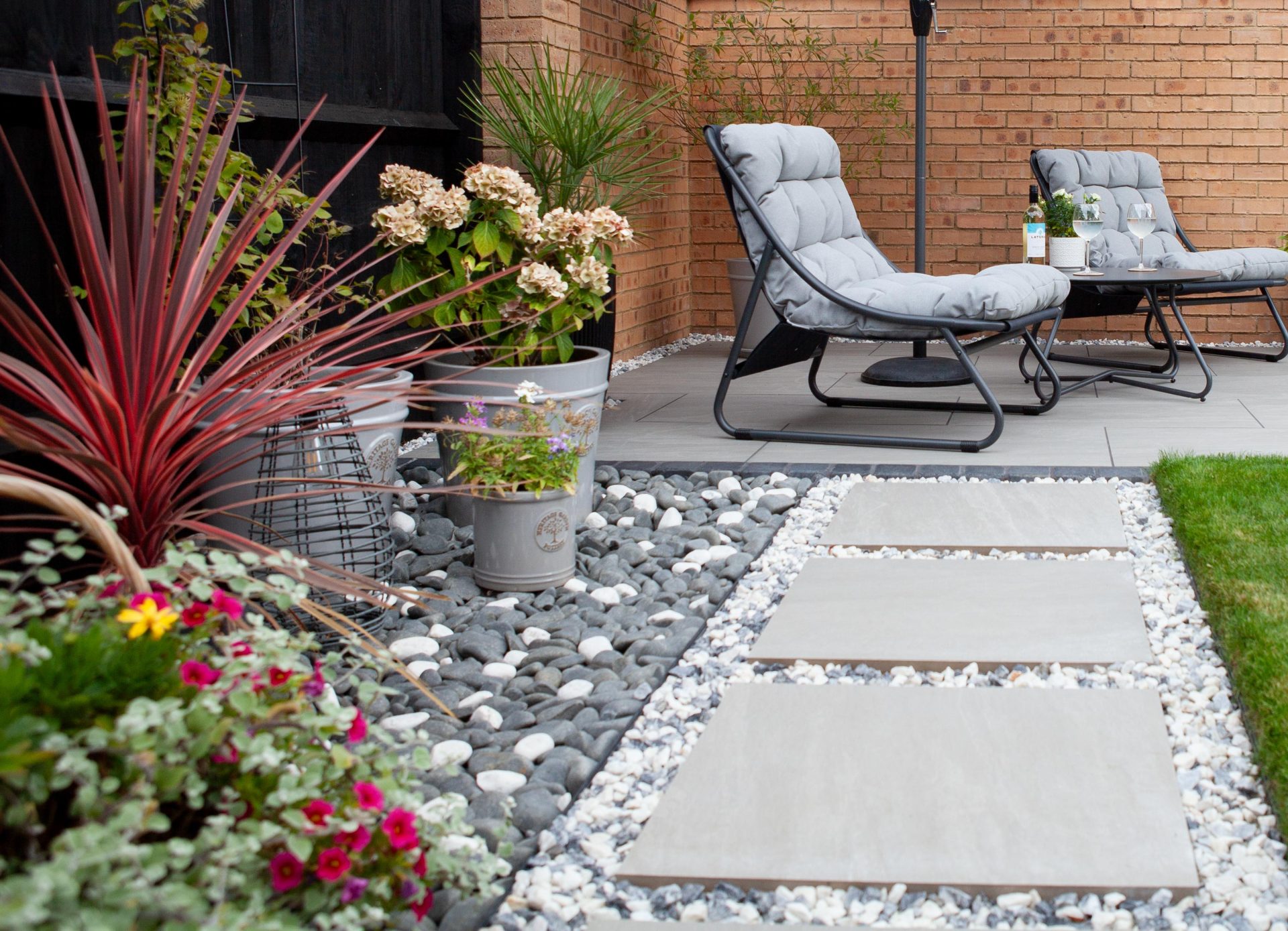 Hertfordshiredrivesandlandscapes Luton Nj in the finished Three Patios & Central Lawn garden in Luton.