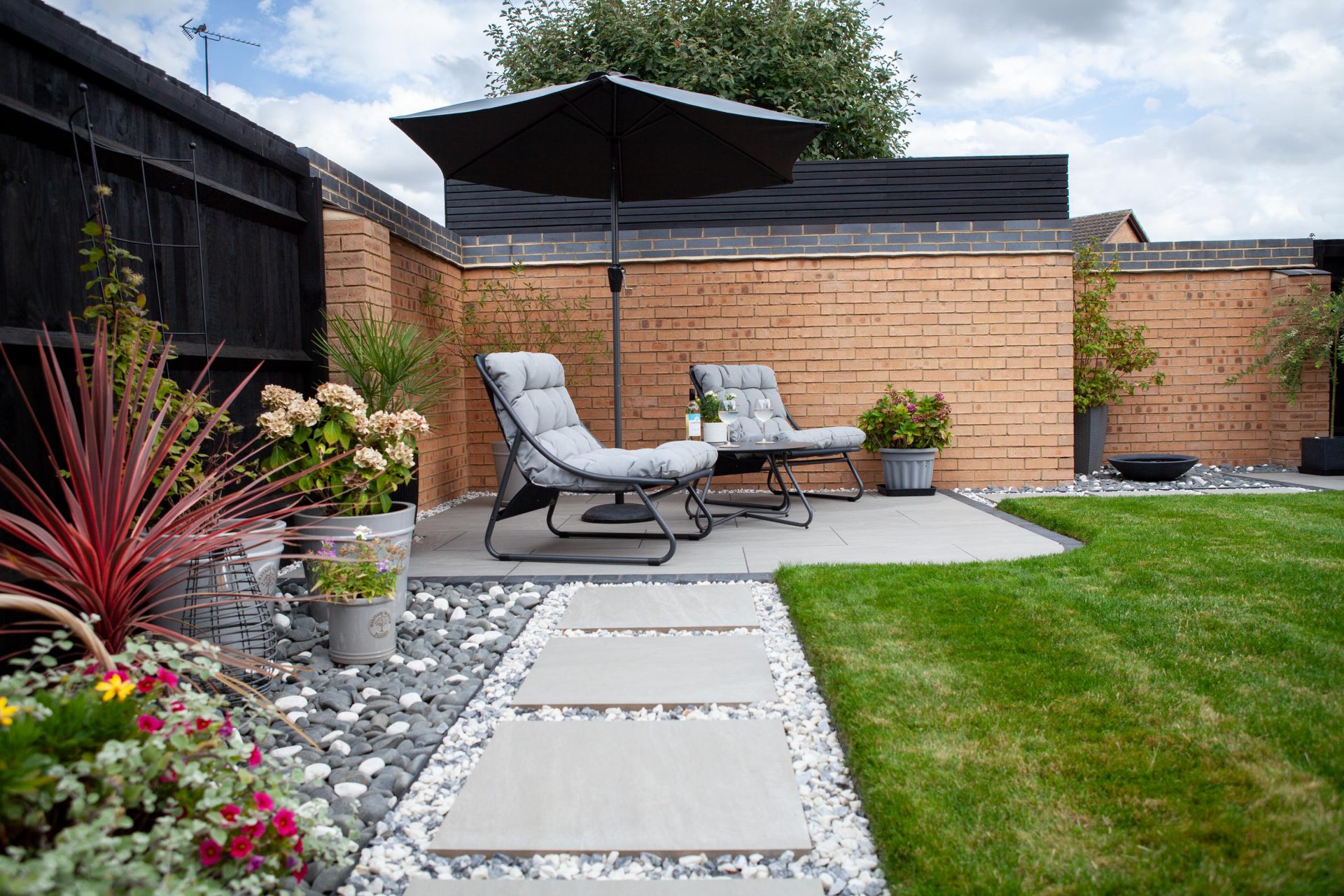 Hertfordshiredrivesandlandscapes Luton Nj in the finished Three Patios & Central Lawn garden in Luton.