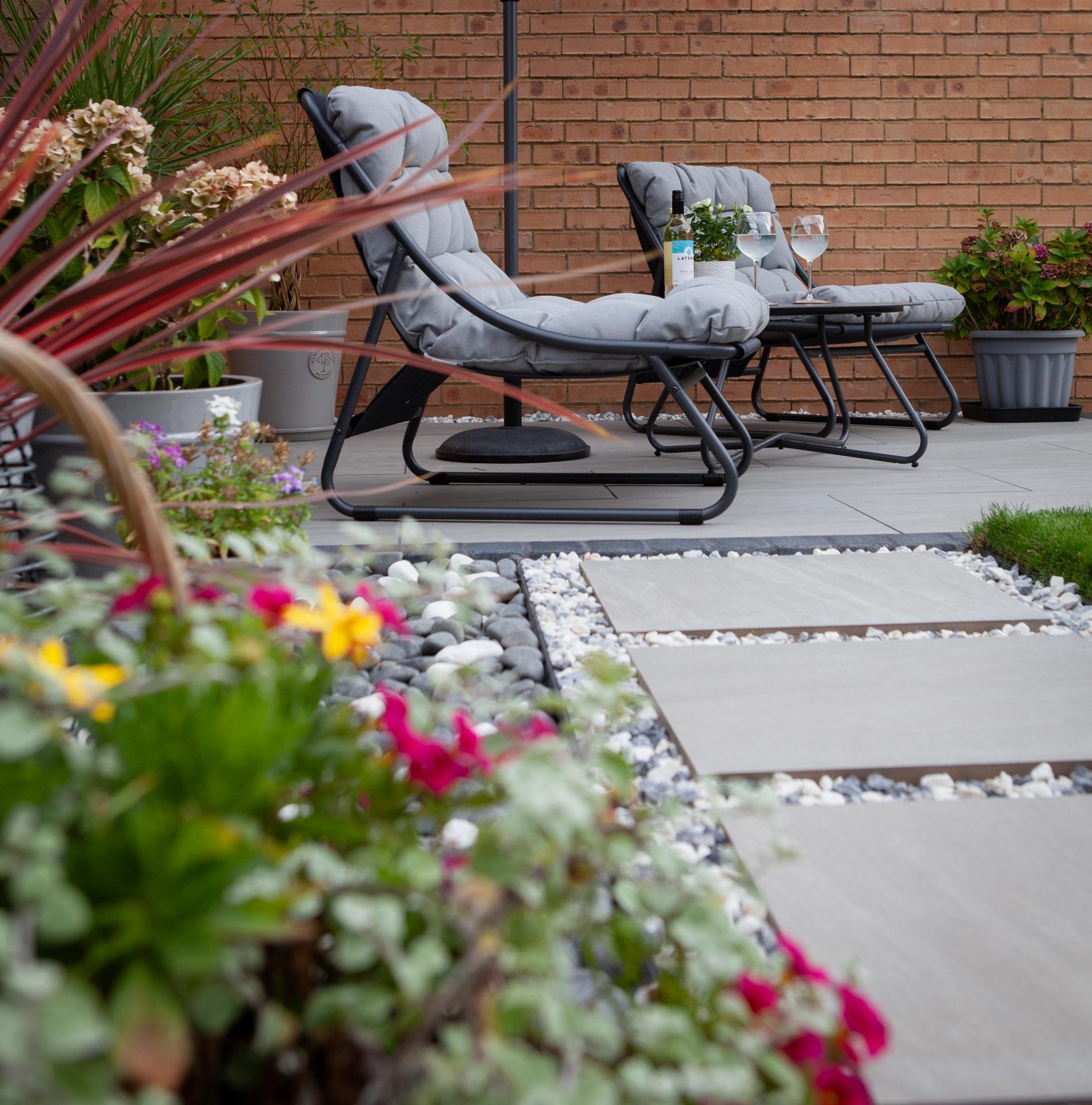 Hertfordshiredrivesandlandscapes Luton Nj in the finished Three Patios & Central Lawn garden in Luton.