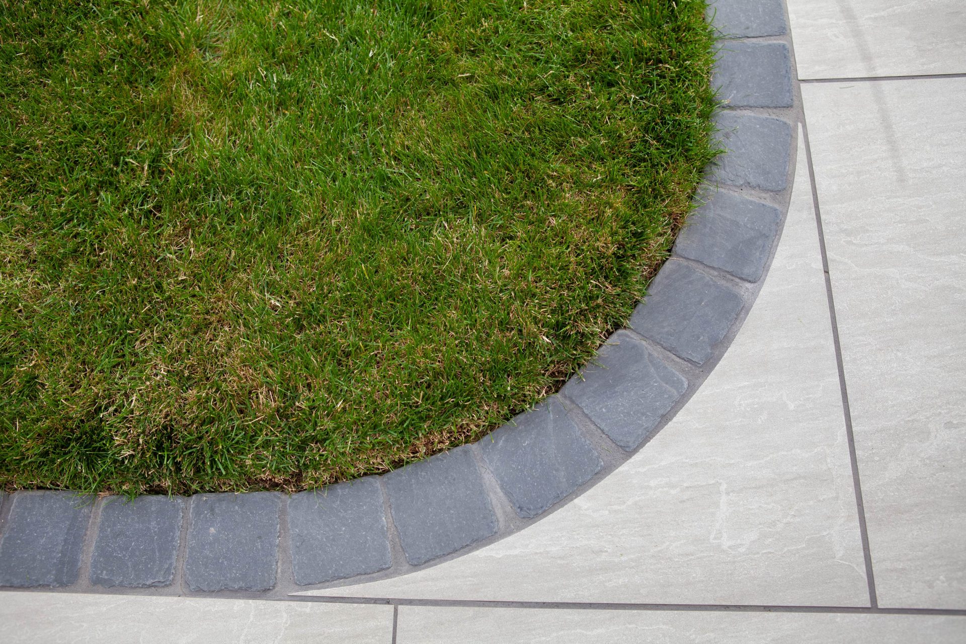 Hertfordshiredrivesandlandscapes Luton Nj in the finished Three Patios & Central Lawn garden in Luton.