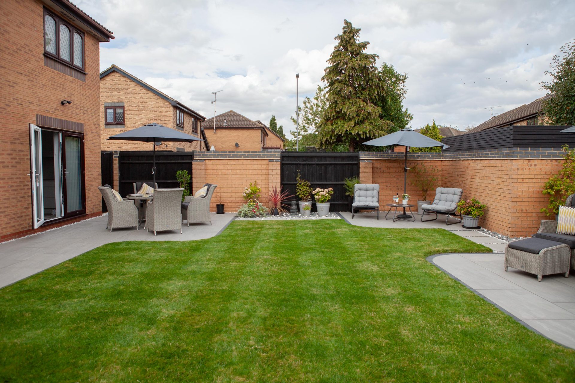 Hertfordshiredrivesandlandscapes Luton Nj in the finished Three Patios & Central Lawn garden in Luton.